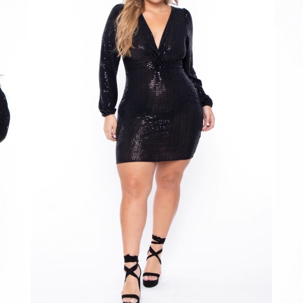 Fitted black sequence dress.